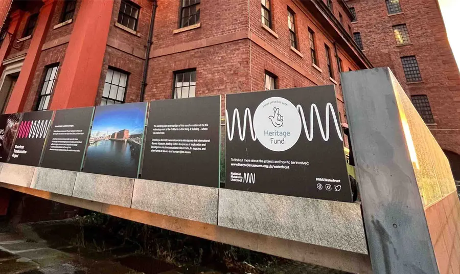 The hoardings barrier has information about the works and features the acknowledgement stamp