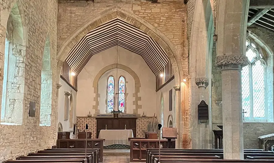 An interior shot of a church. The new ceiling is visible.